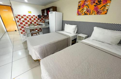 Tambau Apartment | IMPERIAL FLAT com Roupa de Cama, Camareira, vista para o mar.
