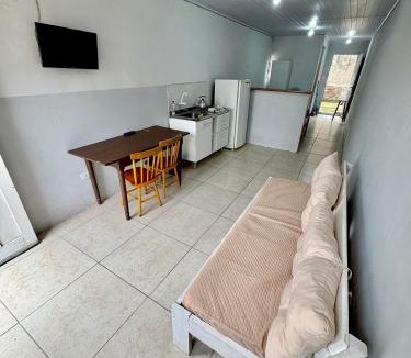 Cassino Apartment | Kitnet a 150m da praia com Ar Condicionado