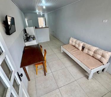 Cassino Apartment | Kitnet a 150m da praia com Ar Condicionado