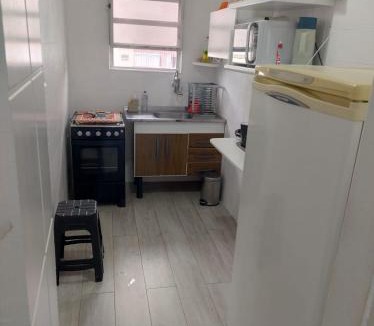 Boqueirao Apartment | Kitnet aconchegante no centro, a poucos passos da praia