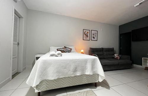 Jardim Camburi Apartment | Kitnet Aconchegante em ambiente Familiar a 100m Praia Camburi com Garagem
