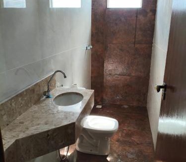 Arcos House | Lar Doce Lar Realizando Sono suíte1