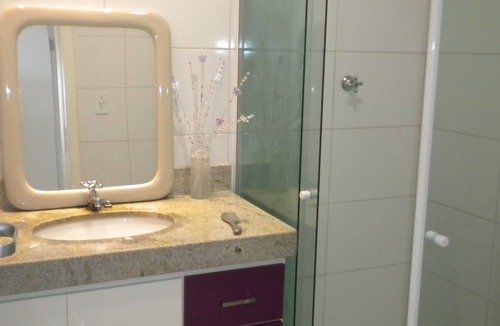 Enseada Azul Apartment | Large apartment facing beach Bacutia with 3 suites and gourmet balcony