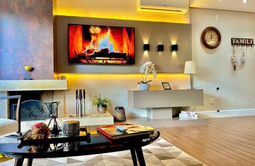 Carniel Apartment | Lindo e aconchegante com lareira cond c/piscina