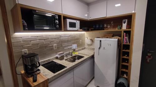 Sao Benedito Apartment | Lindo studio na área central de Poços