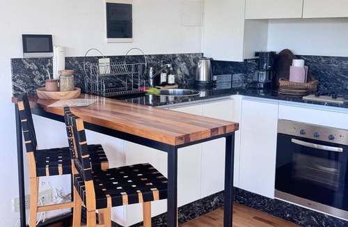 Villa Carlos Paz Apartment | Lodge Two with lake view. An intimate refuge.