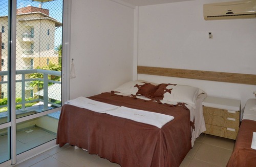 Porto das Dunas Apartment | Luxurious duplex on the seafront, sleeps 13 people, with 6 bedrooms, 5 bathrooms