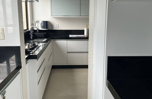 Itapema Apartment | Luxury beachfront apartment with 4 bedrooms, 2 parking spaces, and an unbeatable location.