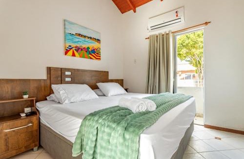Canto Grande House | Mariscal Ideal Refúgio para Famílias, Cama King, Enxoval Completo, 220m do Mar