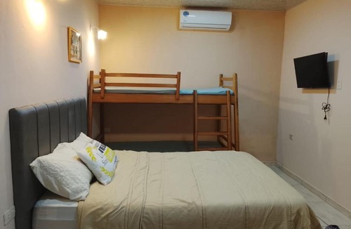Lambare Apartment | Mi Hábitat Lambaré - Habitaciones con Baño Privado, Cocina y Comedor equipados con electrodomésticos, con Quincho al Aire Libre