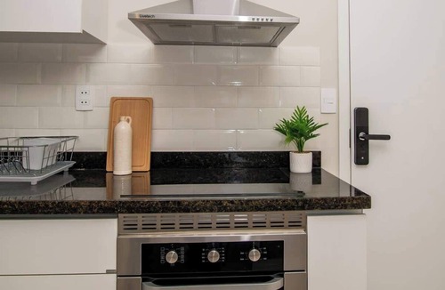 Asuncion Apartment | Modern Business Stay | Work Desk | Pool & Gym