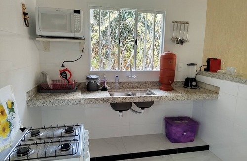 Parque Xangri-La 1a Secao House | Modern house with a country feel.