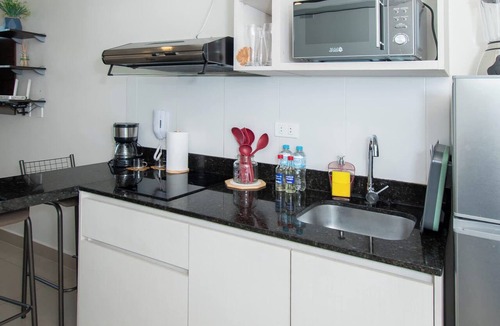 Luque Apartment | Modern Studio in Luque | Rooftop Pool & Fast WiFi