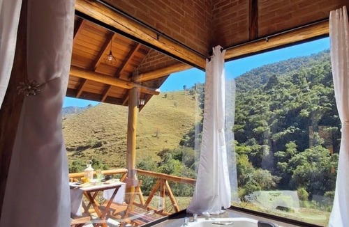 Sapucai-Mirim Ski Chalet | Mountain Mist Chalet - Romantic chalet with mountain views and a hot tub.