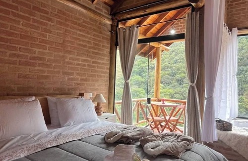 Sapucai-Mirim Ski Chalet | Mountain Mist Chalet - Romantic chalet with mountain views and a hot tub.
