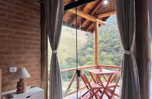 Sapucai-Mirim Ski Chalet | Mountain Mist Chalet - Romantic chalet with mountain views and a hot tub.