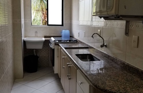 Boraceia Apartment | One-bedroom apartment in a building facing the sea. Boracéia Beach