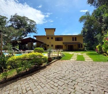 Sao Sebastiao das Aguas Claras House | Piscina Aquecida, 5 Suítes, Lareira e Trilha até o Ribeirão