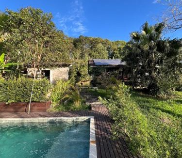Gaspar Grande House | Pool amid the green