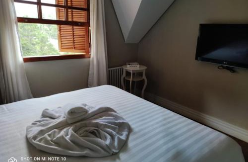Jardim Andira Hotel | Pousada Château dos Fontes