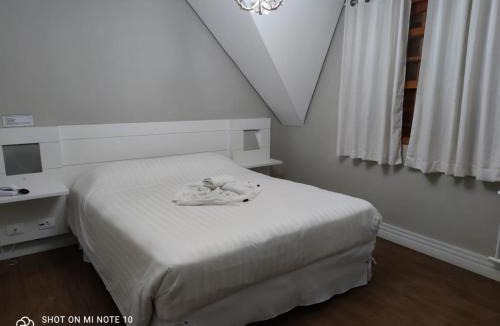 Jardim Andira Hotel | Pousada Château dos Fontes