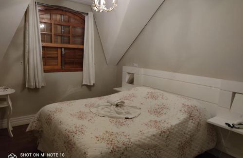 Jardim Andira Hotel | Pousada Château dos Fontes