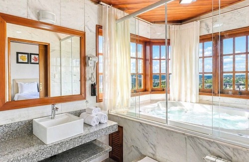 Vila Everest Hotel | Pousada Chateau Elegance