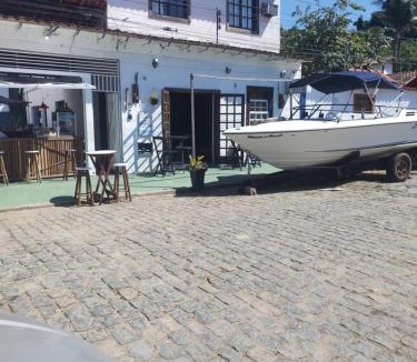 Pontal Hotel | Pousada Dádiva 4 Quarto compartilhado Feminino Econômico e Simples Praia do Pontal Centro