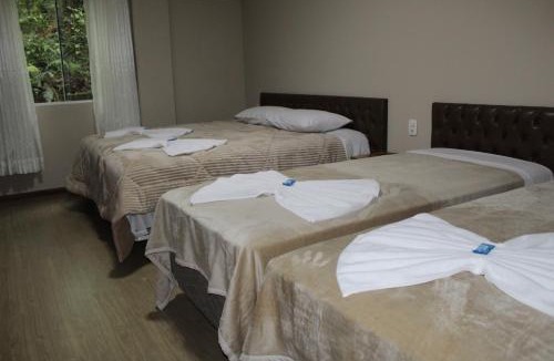Portico Hotel | Pousada Essência Serrana Gramado