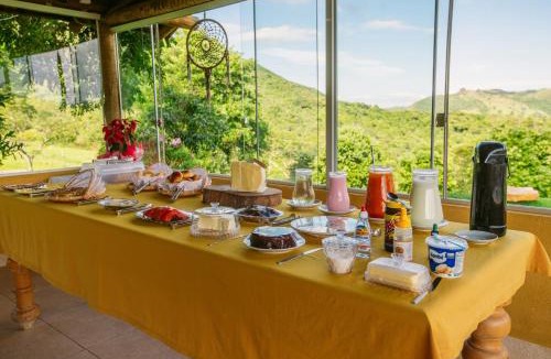 Guape Hotel | Pousada Mirante dos Ipês - Experiência Rural em Capitólio