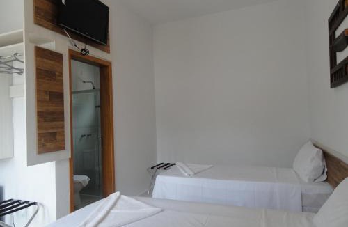 Praia da Enseada Hotel | Pousada Pescador