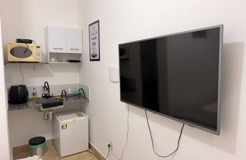 Camargos Apartment | Private studio with TV and private bathroom.