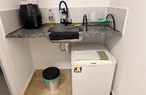 Camargos Apartment | Private studio with TV and private bathroom.
