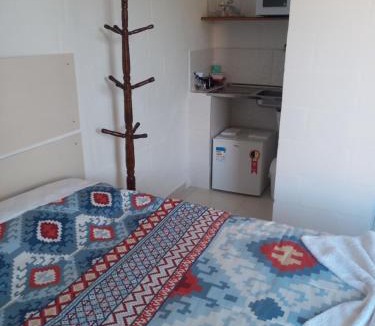 Sao Bento do Sapucai Apartment | Quarto Aconchegante