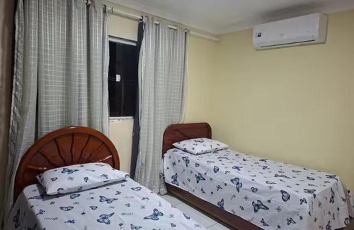 Nova Itaparica House | Quarto com 2 camas, ar-condicionado e piscina em Nova Itaparica