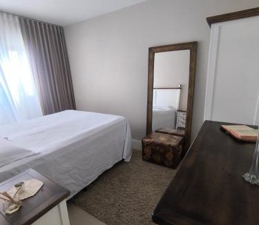 Kobrasol House | Quarto com Suite Privativo