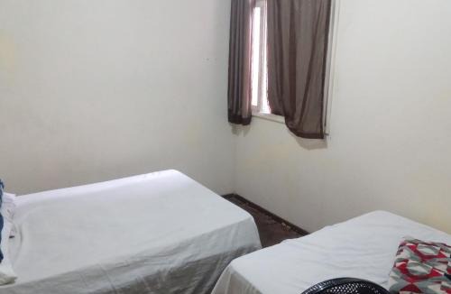 Nazareth House | Quarto com vista pra Piscina