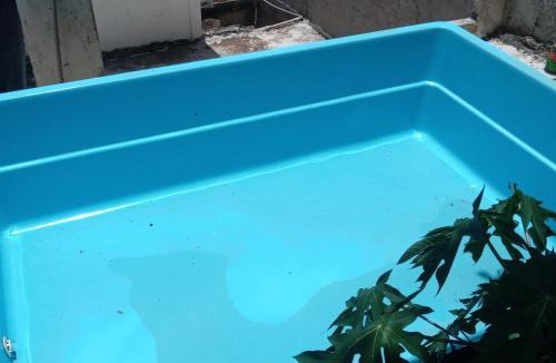 Nazareth House | Quarto com vista pra Piscina