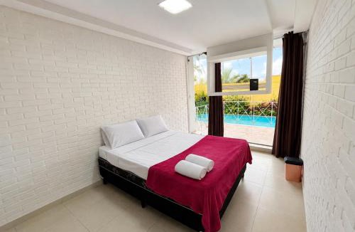 Sao Paulo House | Quarto de casal com piscina no Morumbi