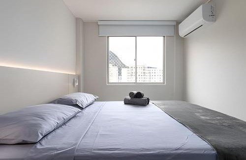 Jacarepagua Apartment | Quarto e sala com vista incrível