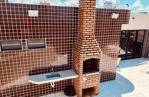Ponta Verde Apartment | Quarto e sala com piscina próximo à praia