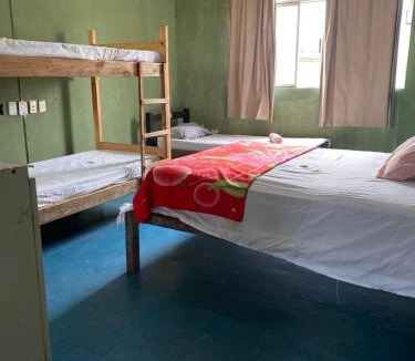 Sete Lagoas Hostel | Quarto econômico central