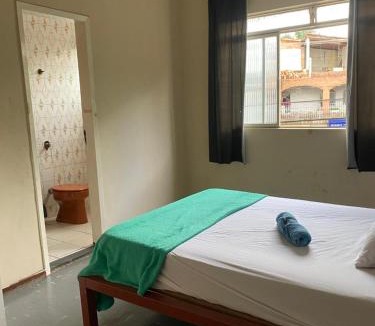 Sete Lagoas Hotel | Quarto no centro