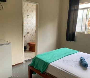 Sete Lagoas Hotel | Quarto no centro