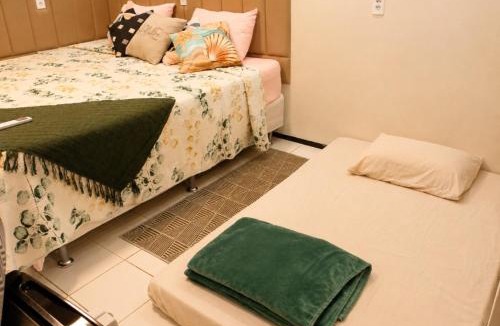 Areia Preta Apartment | Quarto triplo em Petrópolis