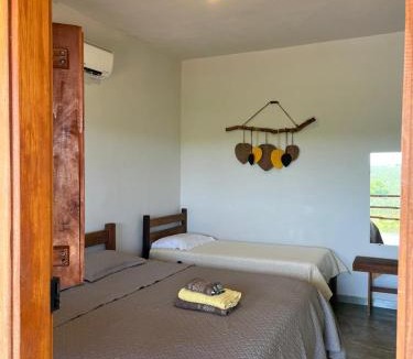Delfinopolis Hotel | Quintal de minas Pousada
