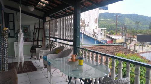 Praia da Enseada Apartment | Recanto da arte Varanda e rede