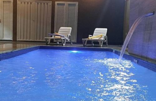 Olimpia House | Recanto Matheus, Casa confortável com estacionamento, wi-fi e piscina aquecida - Olímpia SP