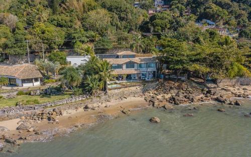 Prainha House | Refúgio da Arara