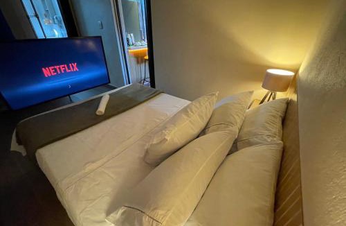 Centro Apartment | Refúgio Premium em Bertioga Entre o Rio e o Mar